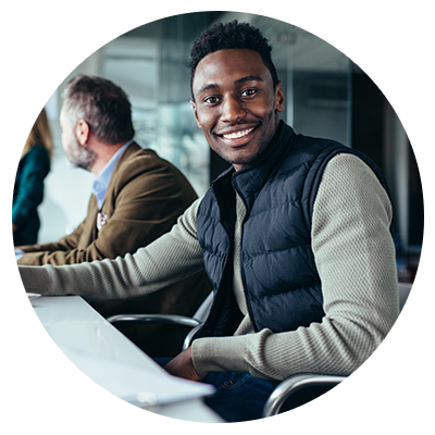 Man at a business meeting smiling