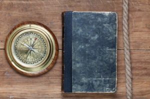 Nautical compass log book and rope 